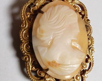 Vintage Miriam Haskell shell carved cameo brooch