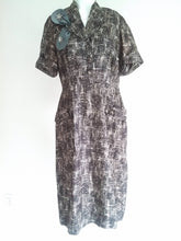 Load image into Gallery viewer, vintage 50s atomic pattern pocket dress with Satin Bow and Rhinestone detail - size large