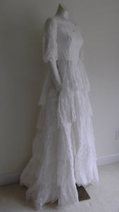 Vintage 50s five tiered lace wedding dress with small train and attached tulle net crinoline underskirt