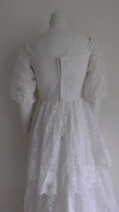 Vintage 50s five tiered lace wedding dress with small train and attached tulle net crinoline underskirt