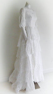 Vintage 50s five tiered lace wedding dress with small train and attached tulle net crinoline underskirt